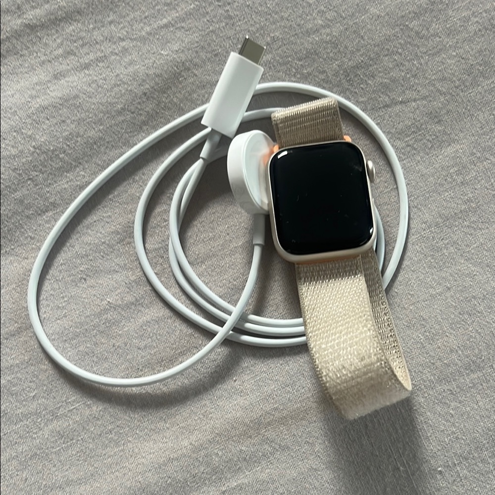 Smartwatch with Cream Band and Charger